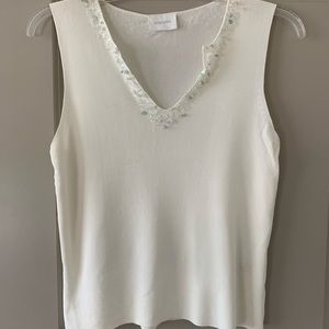 Gorgeous knit sleeveless sweater with bead detail